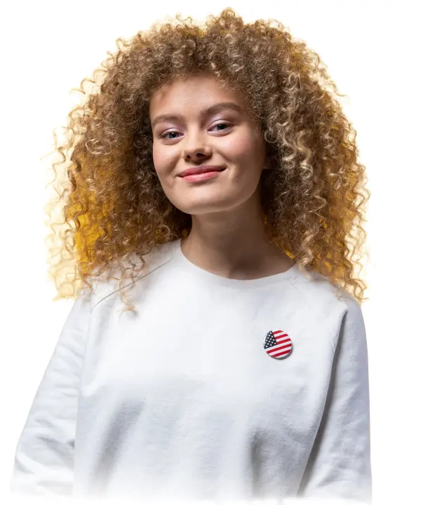 Smiling Woman Wearing an American Flag Pin